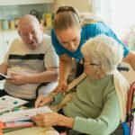 Caregiver assisting older adults in a healthcare setting
