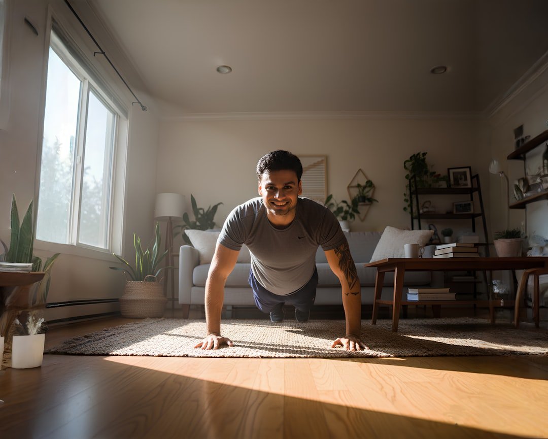 Person demonstrating a beginner bodyweight squat exercise at home