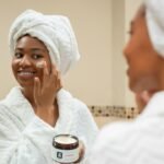 Woman practicing a simple skincare routine with facial cream